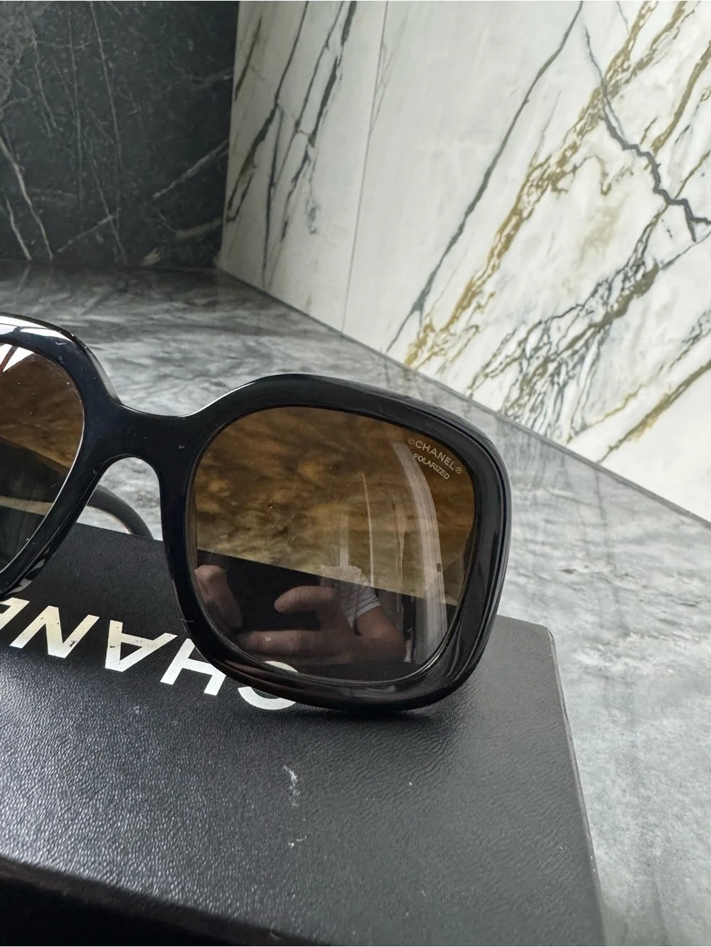 CHANEL Black Sunglasses with Gold Logo Accent